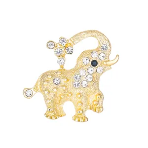 Elegant gold-tone alloy elephant brooch with sparkling rhinestones and floral detail.