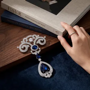 Vintage palace style teardrop brooch with sapphire blue crystals and diamonds