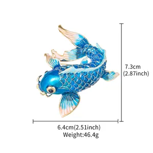 Detailed macro view of blue koi fish enamel brooch pin with dimensions and weight.