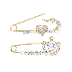Premium gold-tone alloy rhinestone safety pins featuring elegant crown and diamond designs