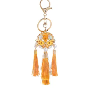Traditional Chinese style embroidered ball tassel keychain with pearls and rhinestones