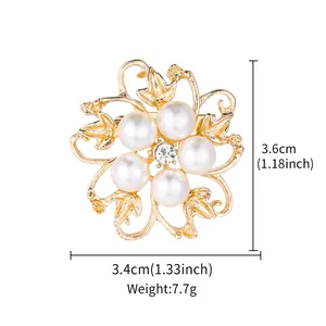 Close-up detail and size specifications of an elegant golden floral pearl brooch for suits