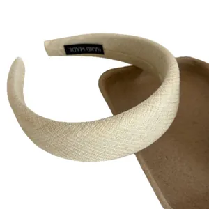 Elegant cream colored wide padded headband hair accessory for heightening head crown