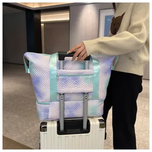 Pastel gradient chevron quilted travel bag with trolley sleeve mounted on suitcase