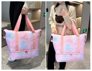 Large pink and blue gradient quilted travel bag featuring a bottom storage compartment.
