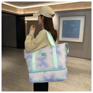 Stylish quilted tie-dye travel bag with a separate bottom compartment for shoes