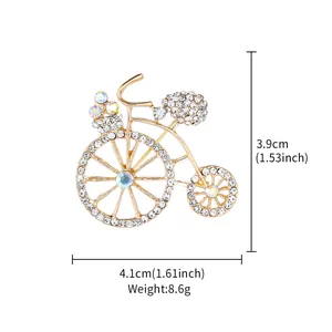 Vista dettagliata della spilla a bicicletta con strass, dimensioni 4,1 cm x 3,9 cm e peso 8,6 g
