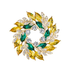 Elegant gold wreath brooch with yellow and green marquise crystals for women accessories