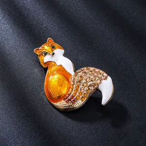 Elegante spilla a forma di volpe con smalto arancione e strass luminosi da donna.