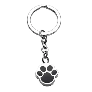 Porte-clés Urne Funéraire pour Animaux en Acier Inoxydable Empreinte de Patte Bijoux de Crémation pour Chien Chat Pendentif Souvenir