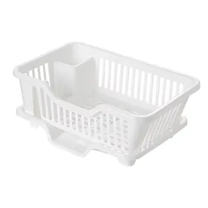White plastic dish drying rack with drip tray and built-in utensil holder detail