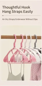 Close-up detail of non-slip plastic clothing hangers with special strap hooks.