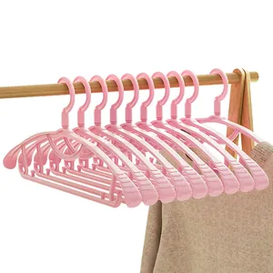 Set of 10 durable pink non-slip plastic clothes hangers for home closet organization
