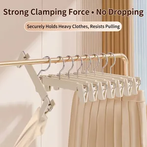 Beige pants hangers with strong grip clips and metal hooks for non-slip storage