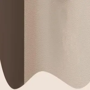 Macro texture detail showing the wood grain finish and surface of a vacuum suction cup hook