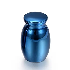 Small blue stainless steel memorial urn for pet or human ashes keepsakes burial.