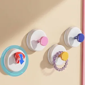 Juego de cuatro ganchos de ventosa de colores para almacenamiento en pared de baño y cocina