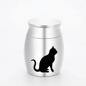 Detailed view of a silver stainless steel pet memorial urn with a black cat silhouette.