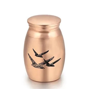 Rose gold stainless steel memorial urn for pets with flying birds engraving detail