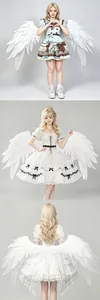 Detailed view of large white feathered angel wings for cosplay and stage performances.