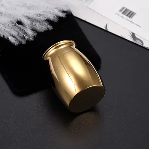 Elegant polished gold mini cremation urn for pet or human ashes memorial keepsake