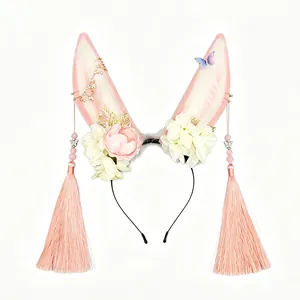 Handmade plush rabbit ear headband with pink tassels and flowers for Cosplay costumes