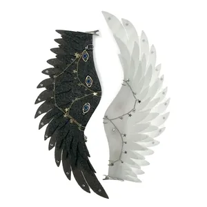 Gothic Seraphim wing hair clips with star chains and evil eye motifs in black and white.