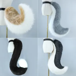 Set of fursuit faux fur beast tails in four colors shown from a side profile view.