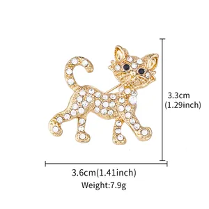 Close-up view of golden cat brooch with rhinestones showing dimensions 3.6cm by 3.3cm
