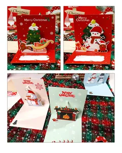 Detailaufnahme von 3D-Weihnachts-Pop-up-Grußkarten mit Schneemann- und Baumdesigns