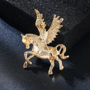 Detailed back view of a golden Pegasus winged horse brooch with secure pin clasp mechanism.