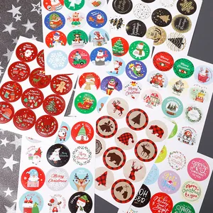 Set of colorful Christmas cartoon stickers with holiday greetings for gift decor
