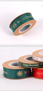 Vue détaillée de rubans de Noël en polyester doré de 2,5 cm pour emballages cadeaux