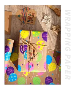 Detailed macro view of eco-friendly birthday kraft wrapping paper with balloon patterns.