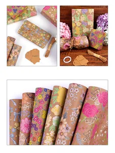 Gros plan de rouleaux de papier cadeau kraft floral vintage avec étiquettes décoratives