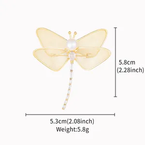 Dragonfly brooch dimensions 5.8x5.3cm with weight 5.8g and pearl zircon detail