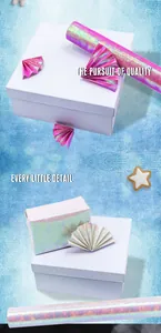 Macro view of holographic glitter wrapping paper showing texture and folded details