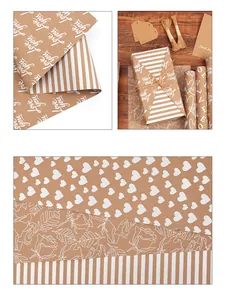 Macro detail of premium kraft wrapping paper featuring white heart and rose patterns.