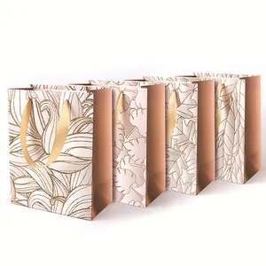 Elegante Papiertüten in Roségold mit Glitzer, Blattmuster und Satinbandgriffen