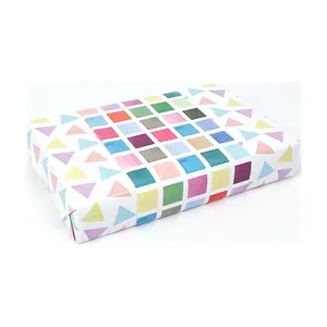 Close-up of colorful geometric triangle and square pattern gift wrapping paper