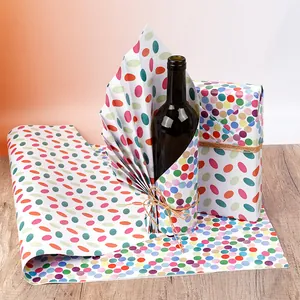 Double-sided coated gift wrapping paper with colorful geometric dots for birthdays
