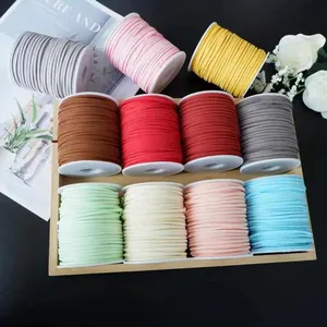 Colorful Korean velvet cords for gift wrapping and floral art displayed in a wooden tray