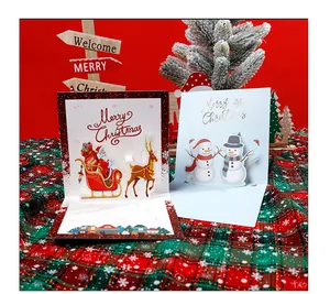 Detailansicht von 3D-Weihnachtskarten mit Weihnachtsmann und Schneemann-Elementen