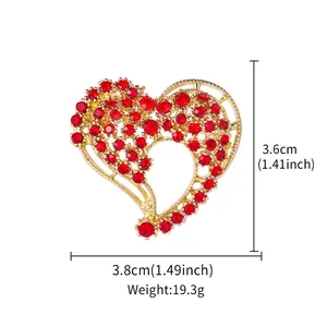 Detailed view of red rhinestone heart brooch with size and weight specifications.