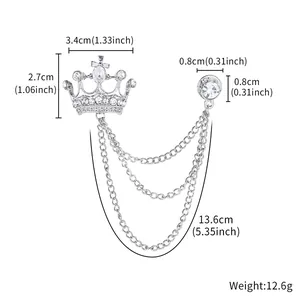 Detailansicht einer silbernen Kronenbrosche mit Kette und Größenangaben in Zoll.