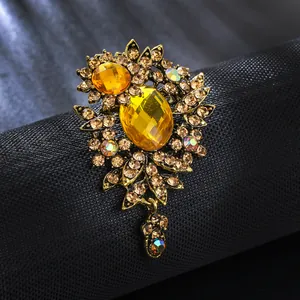 Elegant vintage gold alloy flower brooch with yellow glass rhinestones for women