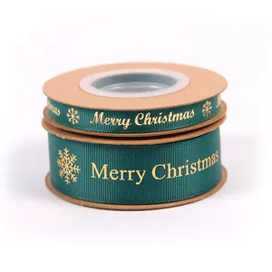 Ruban de Noël vert foncé avec texte Merry Christmas doré pour un emballage cadeau élégant