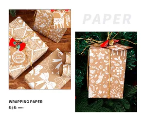 Festliches Weihnachtsgeschenkpapier aus Kraftpapier mit weißen Rentier-Motiven.