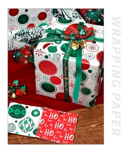 Detailed view of Christmas wrapping paper with festive ornaments and red HO HO HO tags.