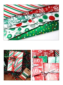 Detail of Christmas gift wrapping paper with metallic foil finish and festive patterns